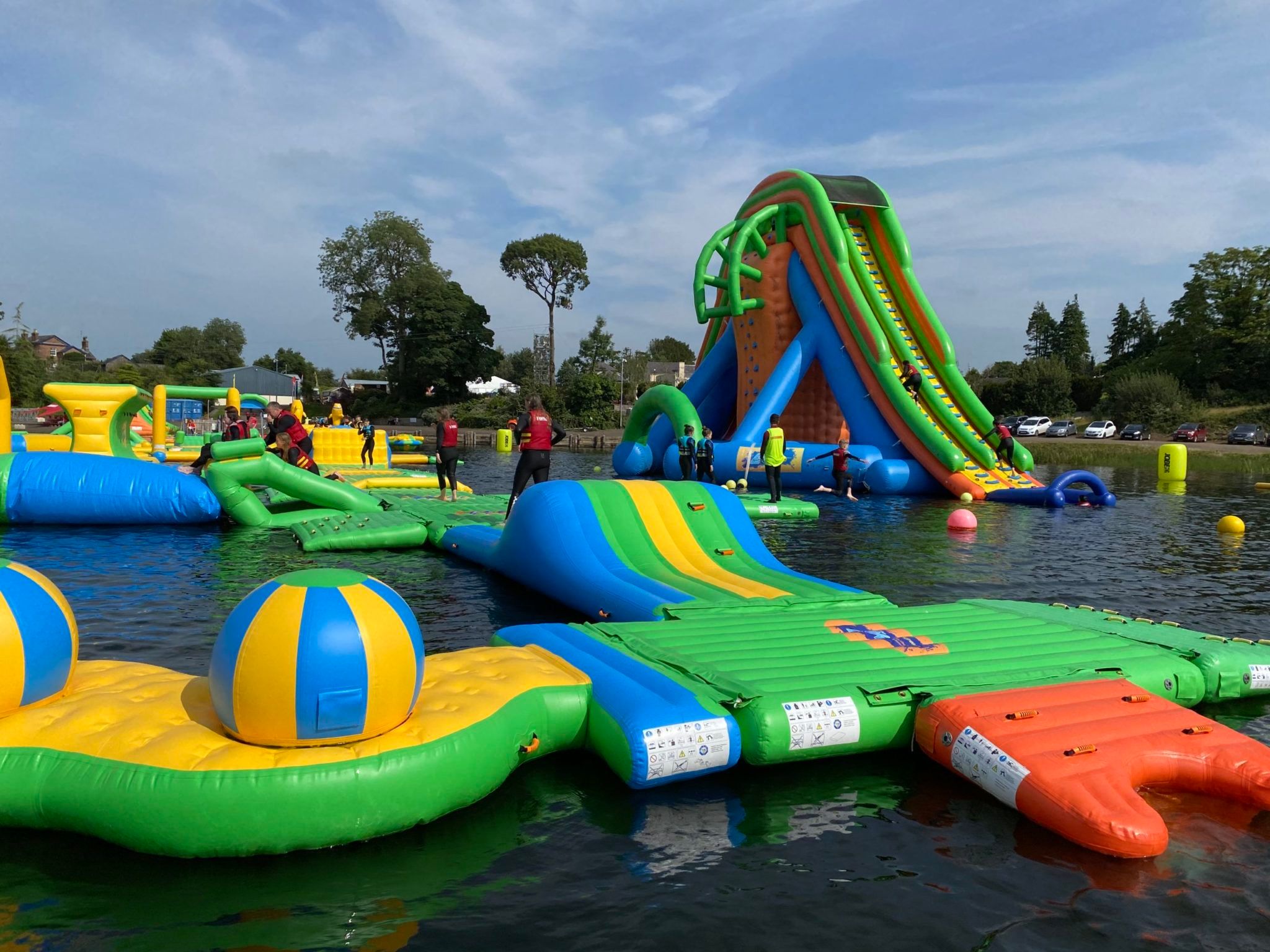 Planning a staycation in Northern Ireland? This water park on a lake is an absolute must