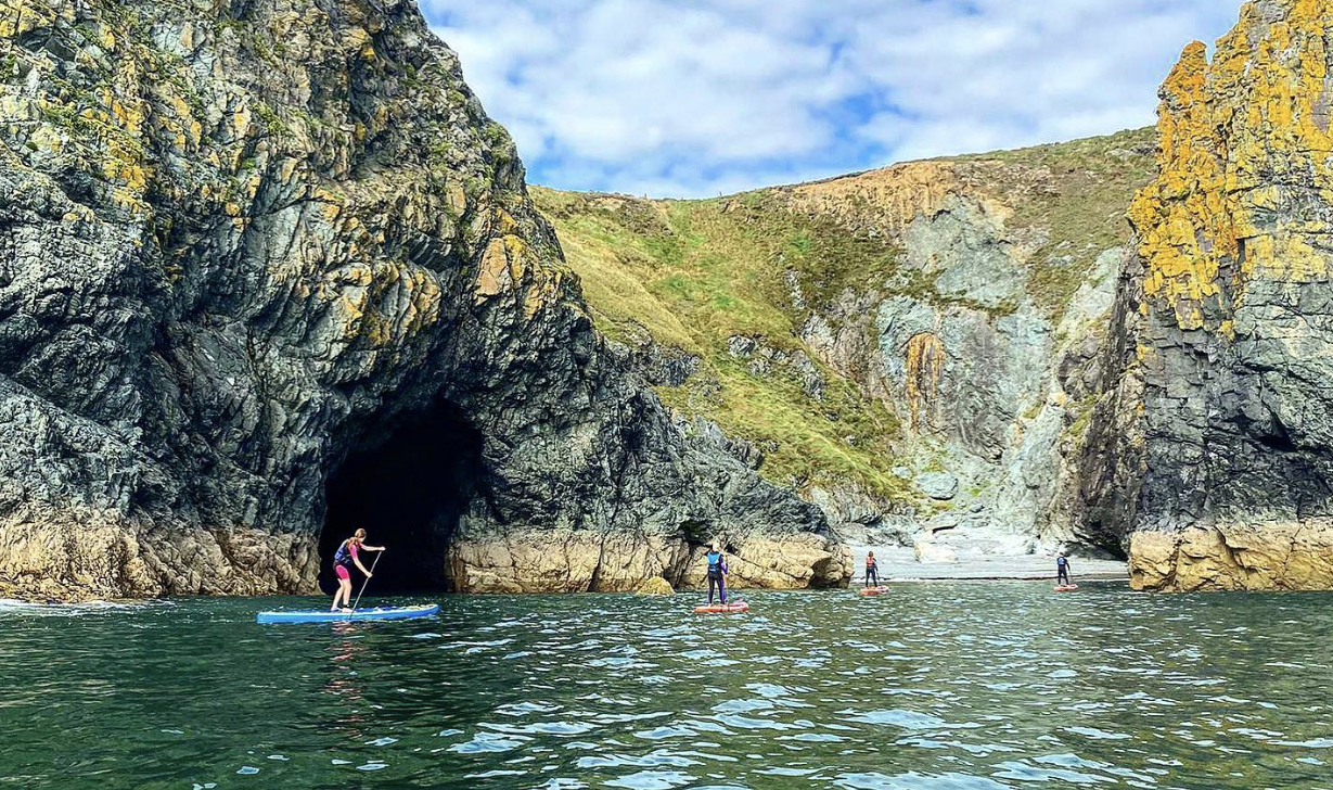 Explore the Copper Coast with this stand-up paddleboarding tour in Waterford