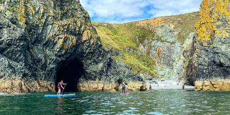 Explore the Copper Coast with this stand-up paddleboarding tour in Waterford