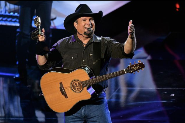garth brooks on stage at a concert