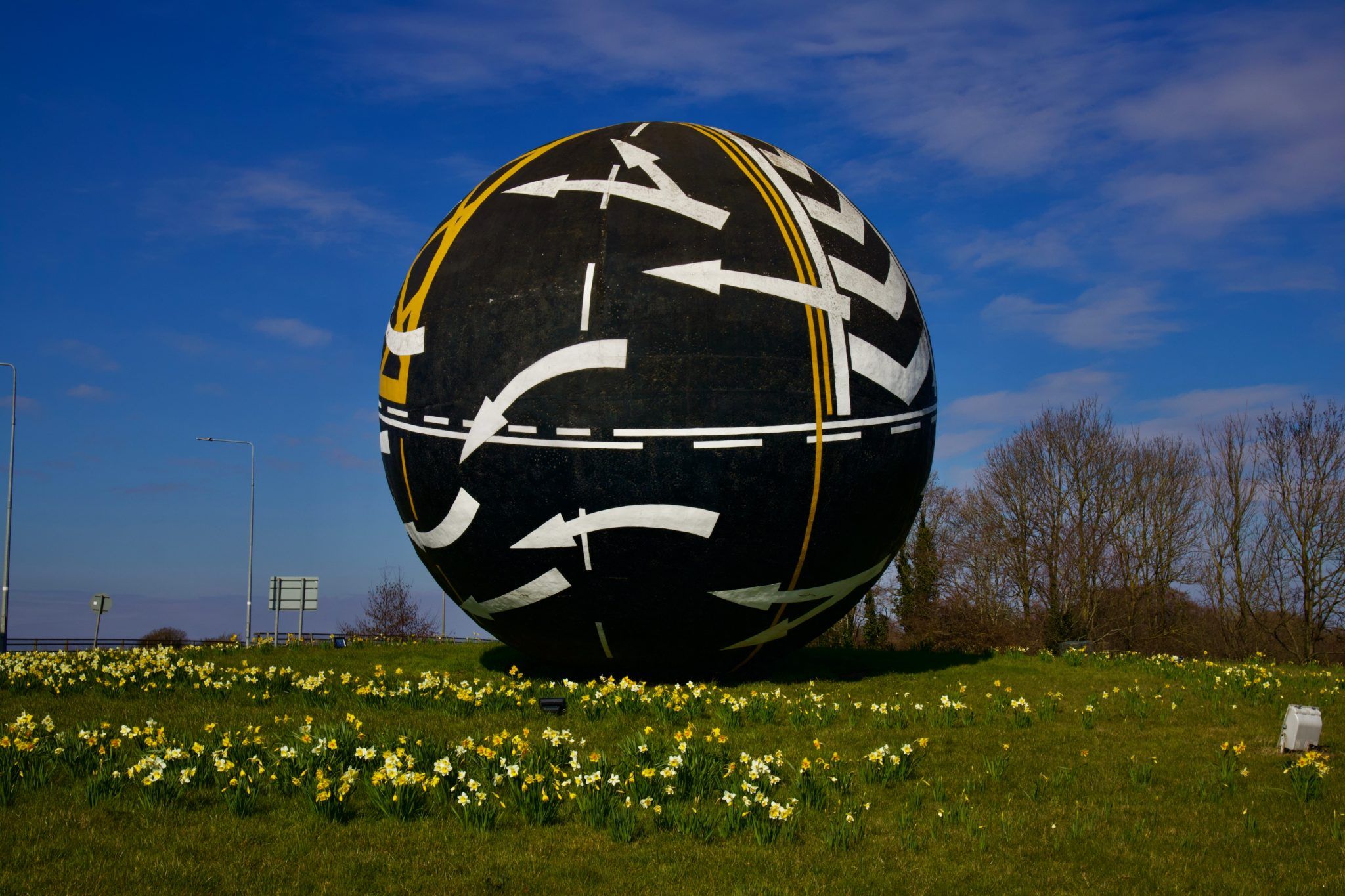 The Naas Ball - a large round statue covered in traffic markings
